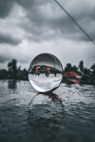 Reflections of Reality: The Inverted Lensball