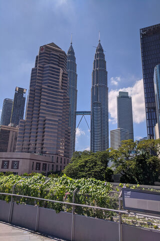 Skyward Dreams: The Iconic Petronas Towers of Kuala Lumpur 🌆✨
