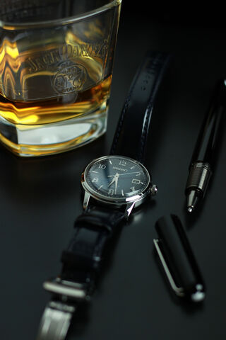 Timeless Elegance: A Moment of Luxury 🕰️🥃