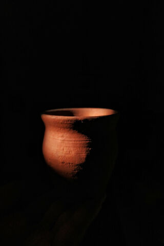 Nature's Embrace: The Earthen Vessel