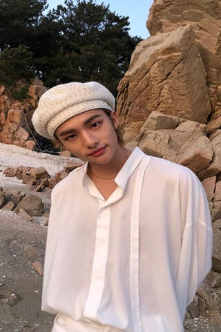 Hyunjin: A Serene Moment by the Shore 🌊✨