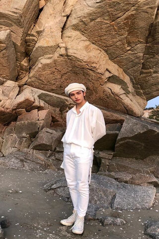 Hyunjin: A Serene Moment by the Shore 🌊✨