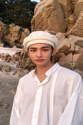 Hyunjin: A Serene Moment by the Shore 🌊✨