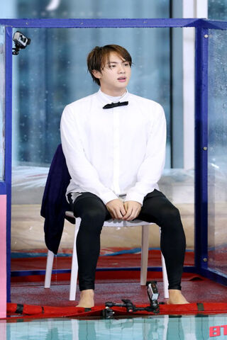 Jin: The Charismatic Idol in Action! 🎤✨