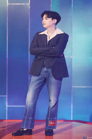 Suga's Stylish Stance: A Fashion Icon in the Spotlight ✨