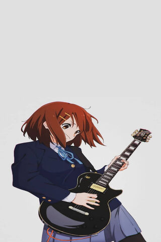 Rocking the Stage: Yui Hirasawa in Action! 🎸