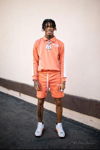 Vibrant Vibes: NLE Choppa's Stylish Streetwear