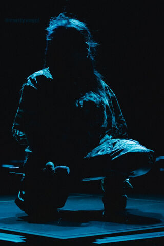 Mystique in Shadows: The Billie Eilish Experience