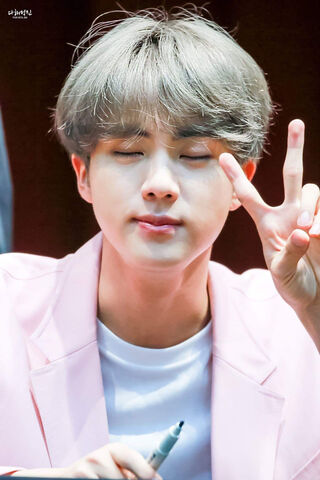 Jin's Charming Peace Sign ✌️✨