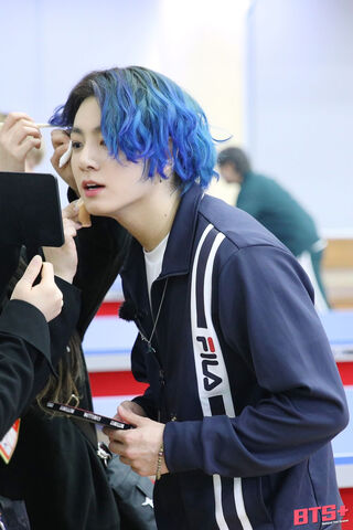 JungKook: The Charismatic Idol with a Splash of Color 🌈✨