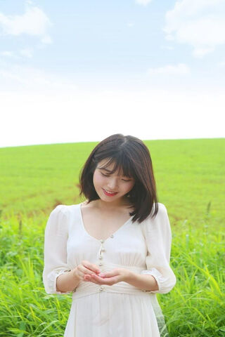 Whispers of Nature: IU in a Serene Moment 🌿✨