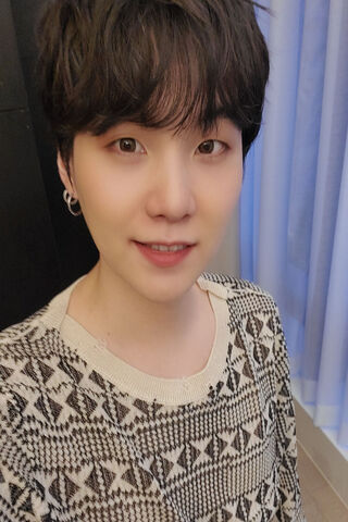 Charming Yoongi: A Moment of Warmth 🌟