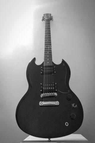 The SG Guitar: A Rock Legend in Black