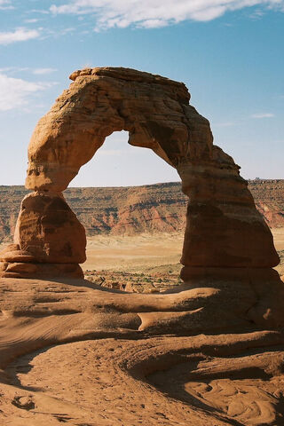 Nature's Majestic Gateway: Arches Sandy Canyon