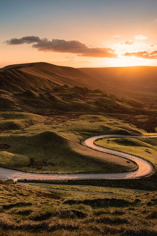 Serene Sunset Over Rolling Hills 🌅
