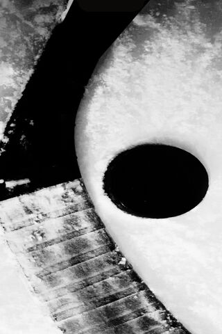 The Perfect Shot: Hockey Stick and Puck in Action! 🏒🥅