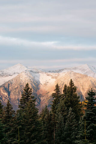 Morning Glow Over Majestic Peaks 🌄