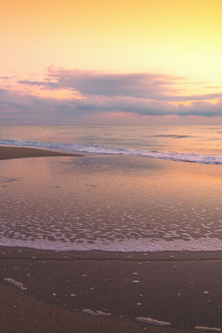 Golden Horizons: A Tranquil Evening by the Shore 🌅