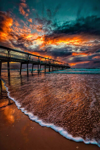 Twilight Reflections: A Pier's Embrace