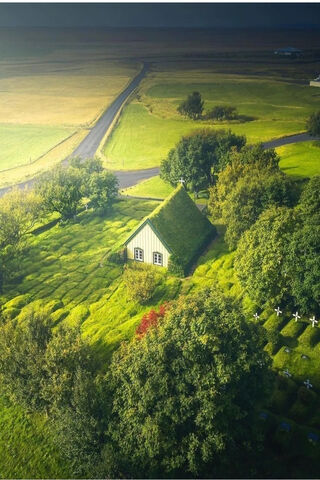 Whispers of Iceland: Nature's Embrace 🌿🏡