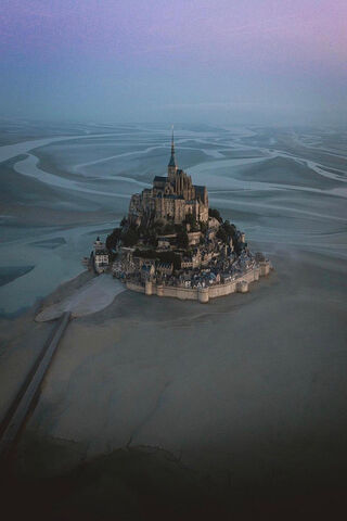 The Enchanting Isle of Le Mont-Saint-Michel 🌅🏰
