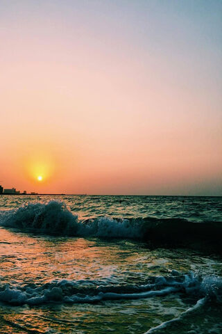 Serene Sunset Over the Waves 🌅🌊