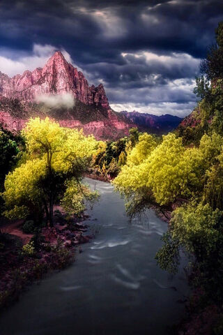 Majestic Peaks and Serene Streams 🌄💧