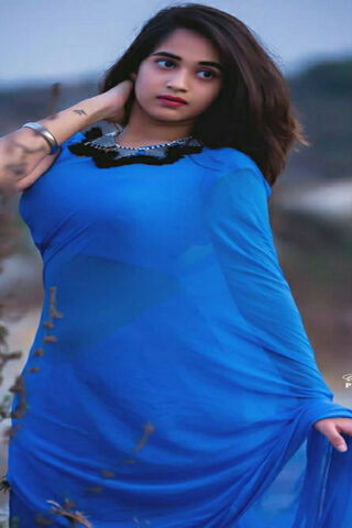 Elegance in Blue: A Glimpse of Deepthi Sunaina