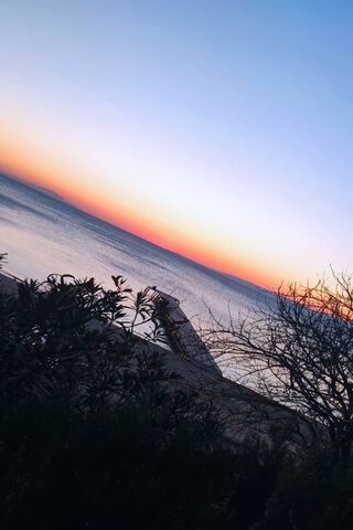 Deniz: A Serene Sunset by the Sea 🌅