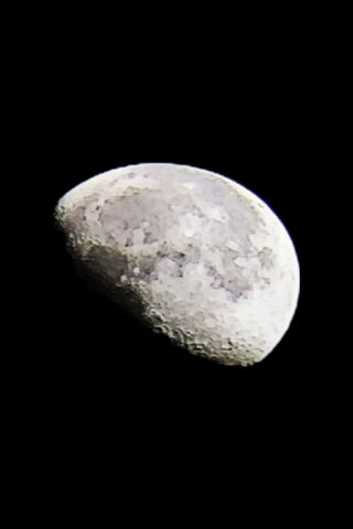 Lunar Majesty: A Glimpse of the Moon's Surface 🌙✨
