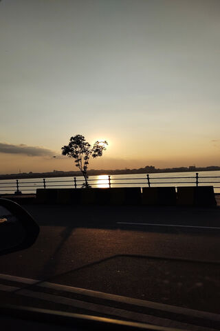 Sunset Serenity at Hussain Sagar 🌅