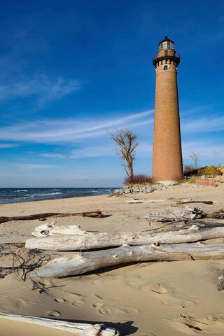 Beacon of Little Sable Point: A Coastal Gem 🌊🏖️