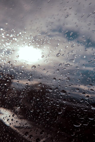 Dancing Drops: A Rainy Sunlit Moment ☔🌞