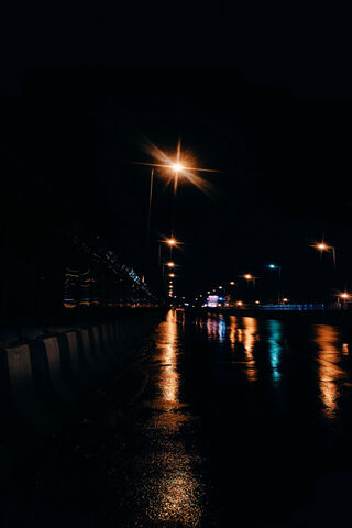 Midnight Reflections: A Rainy Night's Glow 🌧️✨