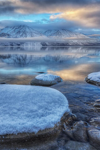 Winter's Embrace: The Serenity of Snowy Mountains ❄️🏔️