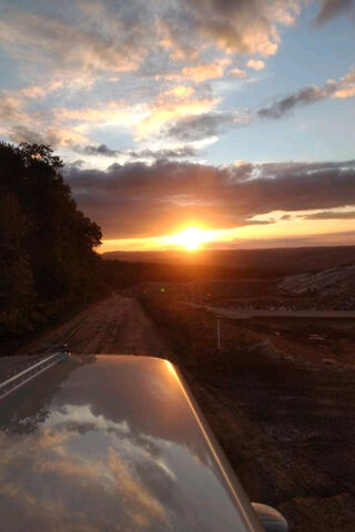 Golden Horizons: The Sunset Over the Peterbilt