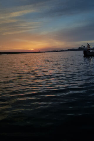 Golden Horizons: A Tranquil Evening at Port