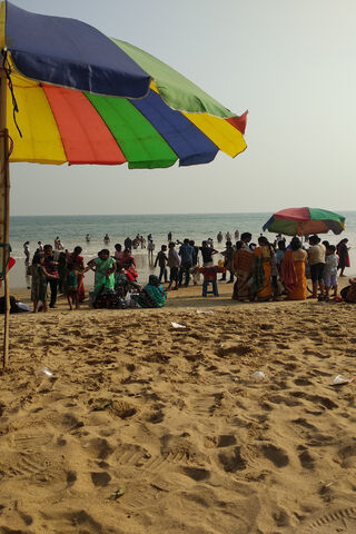 Sunny Shores and Colorful Umbrellas 🌞🏖️