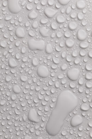 Nature's Tiny Jewels: A Close-Up of Droplets 💧✨