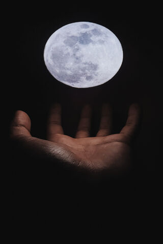 Holding the Moon: A Touch of Magic 🌙✨