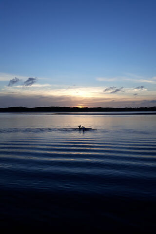 Serenity at Sea: A Tranquil Evening Paddle 🌅🚣 