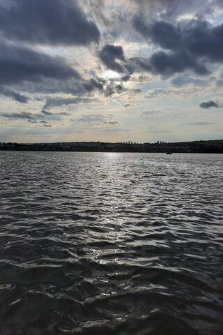 Serenity by the Water: A Tranquil Lake View 🌅