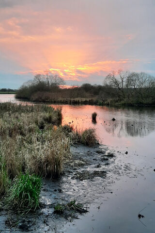 Twilight Reflections: A Serene Sunset