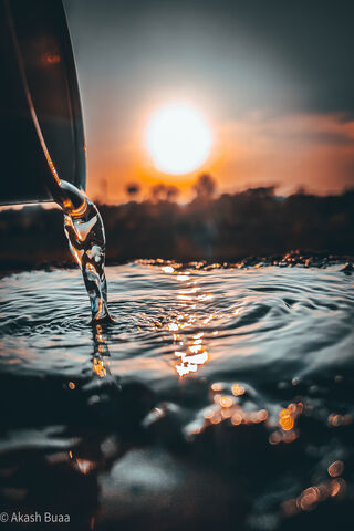 Sunset Reflections: The Dance of Water
