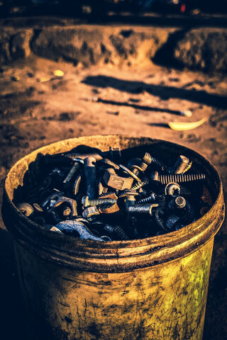 Rustic Treasures: The Aesthetic Bucket of Hardware