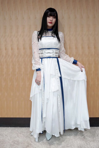 Elegance in White: The ASCA Singer