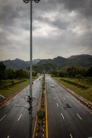 Serenity on the Streets of Islamabad 🌧️🌳