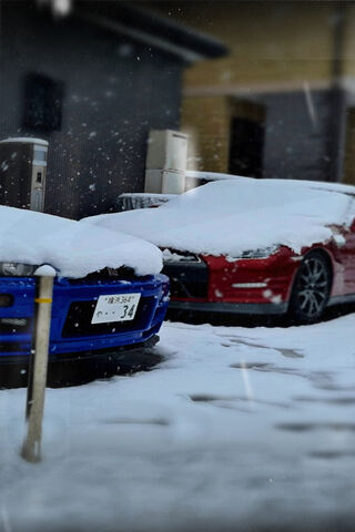 Winter's Embrace: The Nissan GT-R Duo ❄️🚗