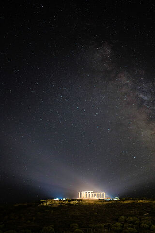 Celestial Guardians: The Temple of Poseidon Under the Stars