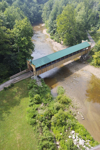 Nature's Pathway: The Serene Covered Bridge